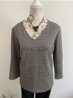   3/4-es ujjú, egyenes szabású szőtt blúz, anyagában tyúkláb mintázattal.