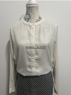   Hosszú ujjú, szűkített szabású elegáns ingblúz, kerekített nyakkal.