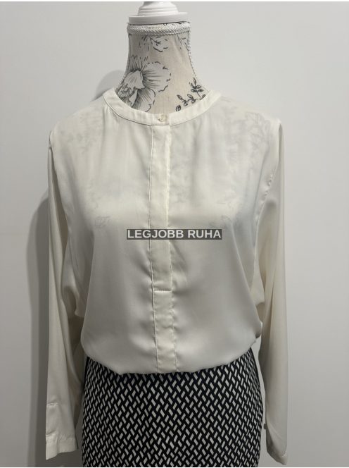 Hosszú ujjú, szűkített szabású elegáns ingblúz, kerekített nyakkal.